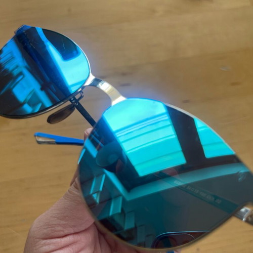 Byblos sunglasses used with metal frame and blue mirror lenses