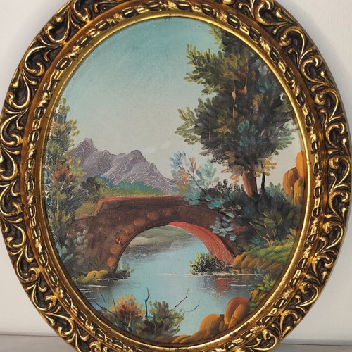 Oval vintage painting on canvas with golden frame used
