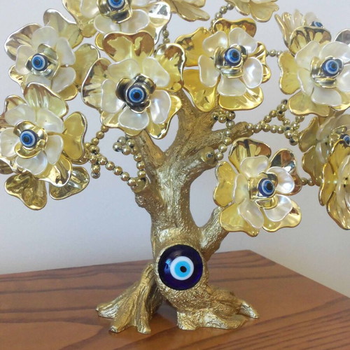 Decorative tree with blue eyes like new, height 27 cm