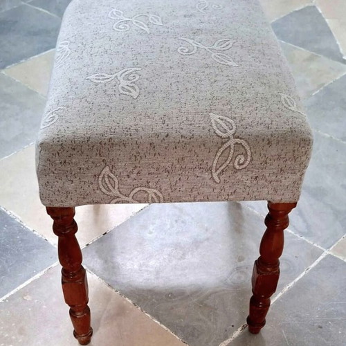 Upholstered Footstool like new with wooden legs
