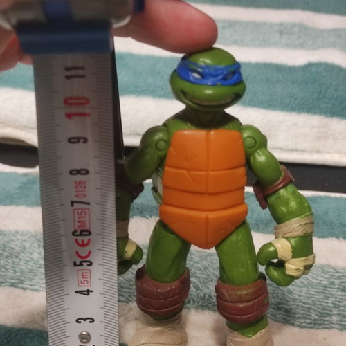 Leonardo Teenage Mutant Ninja Turtle figure used, missing shell