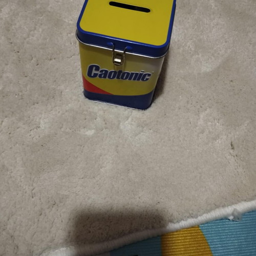 Caotoni tin money box like new, yellow with blue details
