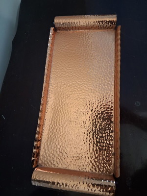 Copper hammered tray with feet, 37.5 x 16 cm