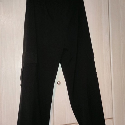 Black cargo pants used, size large