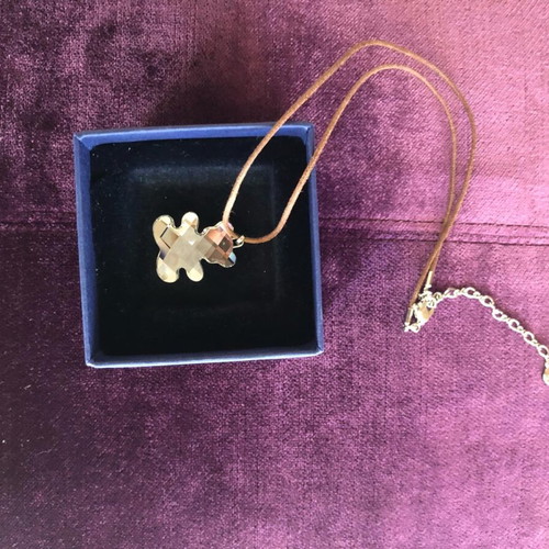 Swarovski bear necklace new with brown leather strap