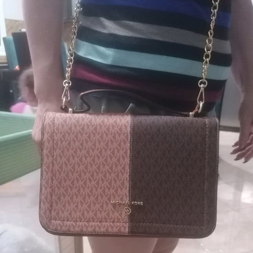 Shoulder bag used with strap for shoulder and hand