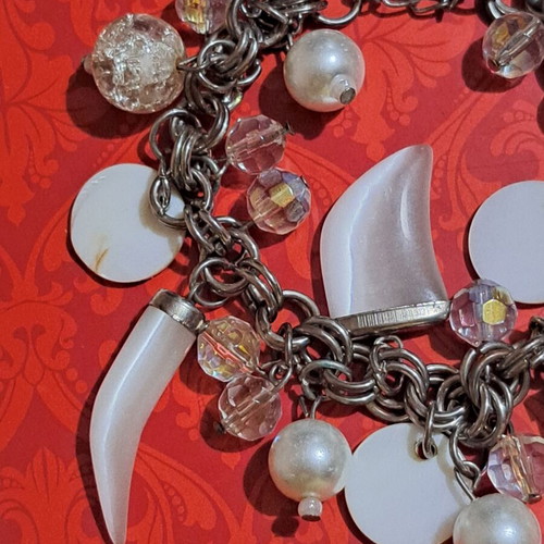 Metal bracelet with shells and glass beads like new, white and silver