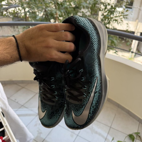 Nike athletic shoes, black and blue, size 44.5