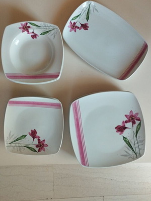 Dinnerware set like new with 1 platter, 6 deep, 4 shallow and 5 small plates
