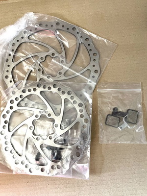 Tektro 180mm and 160mm brake discs with compatible brake pads set