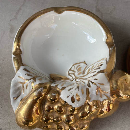 Porcelain vase gilded like new with grape designs and two ashtrays