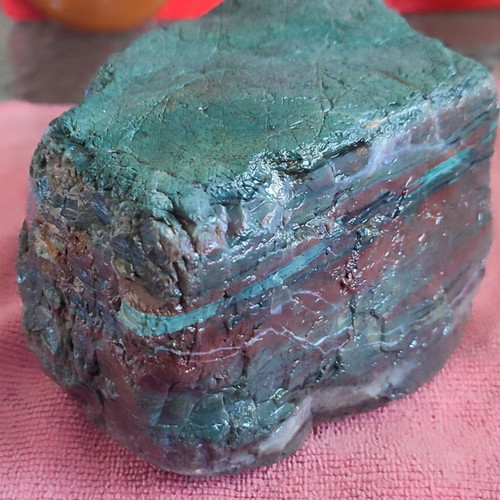 Rock with green, turquoise, brown, blue and white shades, new