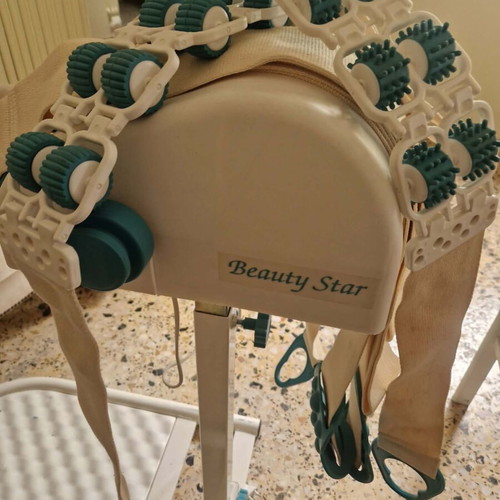 Massage and passive exercise device with rollers and straps like new