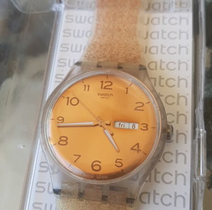Swatch ρολόι χειρός ροζ χρυσό με λουράκι σιλικόνης