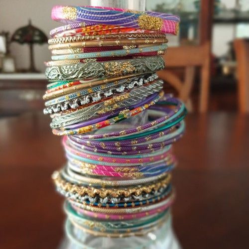 Indian glass bracelets like new, set of 54, colorful and decorated