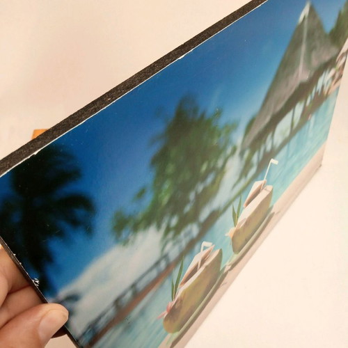 Wooden frame used with tropical pool and coconut motif