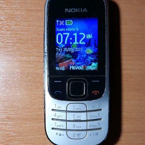Nokia 2330c-2 cell phone used, working with battery and charger