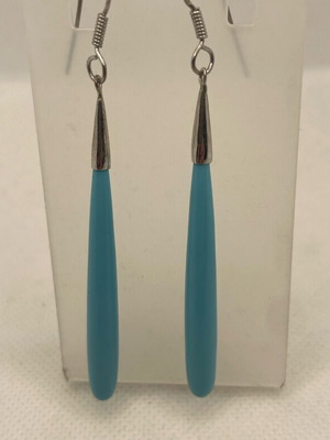 Silver earrings used with turquoise drop