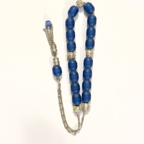 Worry beads with matte blue beads and metal details used