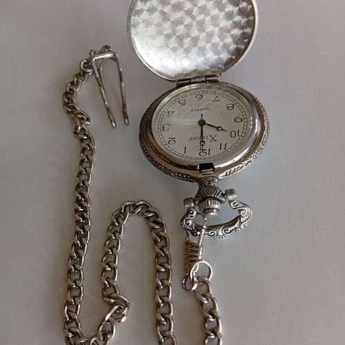 Xtreme men's pocket watch like new with chain and metal case