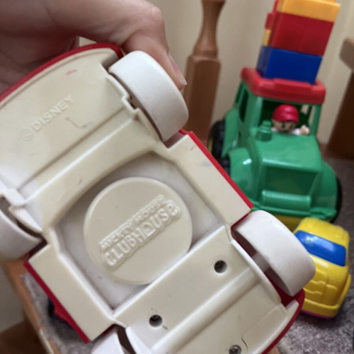 Toy cars, some unused, plastic and metal Mini Cooper