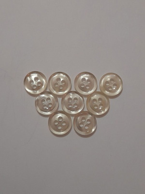 Button set with pearl effect, 9 pieces, new