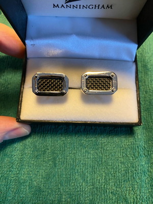Tie rack cufflinks used, black