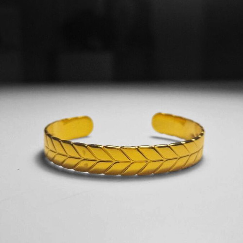 Cuff bracelet made of stainless steel new, gold color with embossed design