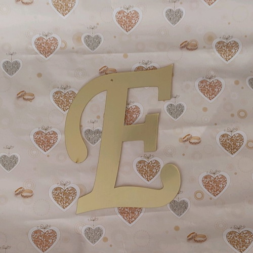 Gold Plexiglass Letter E Candy Bar like new