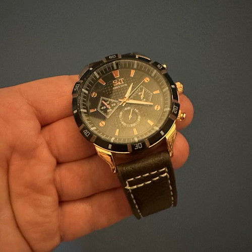 Wristwatch new with leather strap and white stitching
