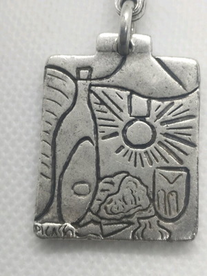 Silver Picasso keychain used
