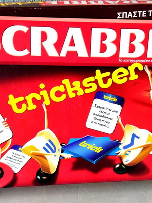 Scrabble Trickster board game used with box wear