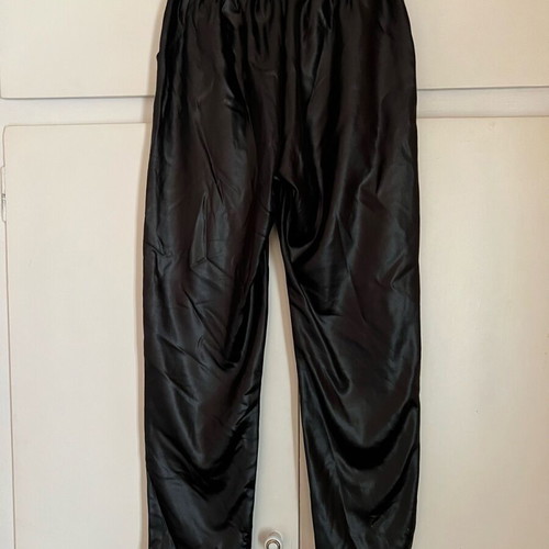 Black leather pants with elastic like new, size L/XL