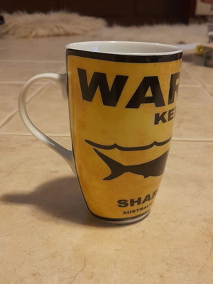 Yellow shark mug new, 13 cm height