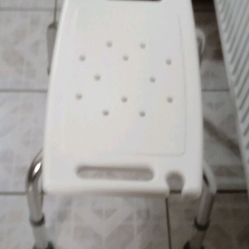Bath stool like new, adjustable height, shower phone holder