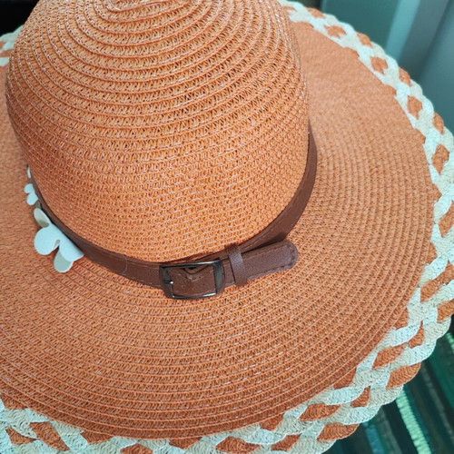 Beach hat like new, orange with flower decoration