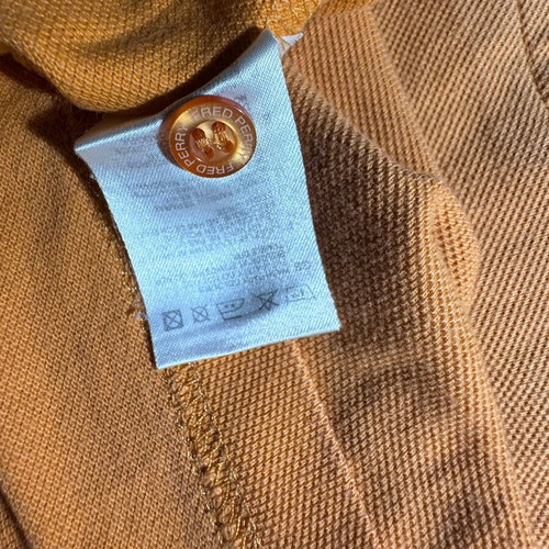 Fred Perry Polo shirt used, orange with navy trim, size M