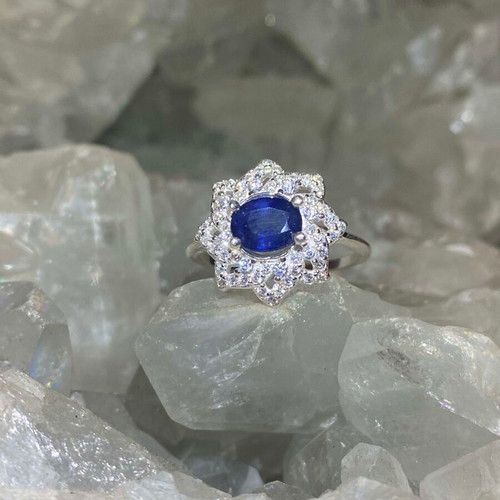 Handmade silver ring with natural blue sapphire and moissanites