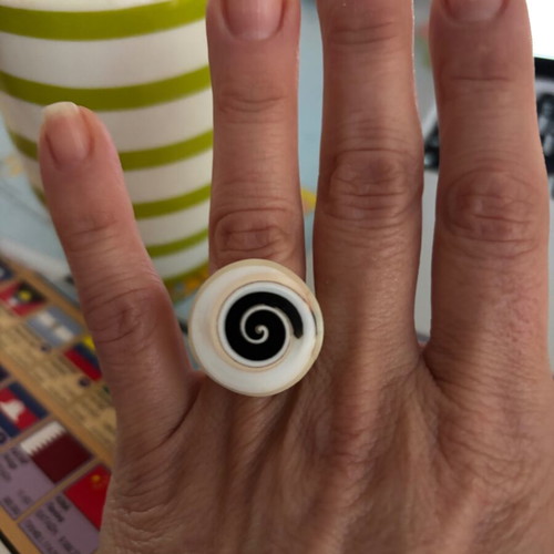 Women's white ring with painted Spira like new
