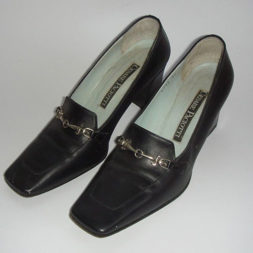 Cesare Paciotti black leather pumps used with chain detail