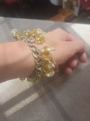 Beaded bracelet used in yellow shades with steel chain