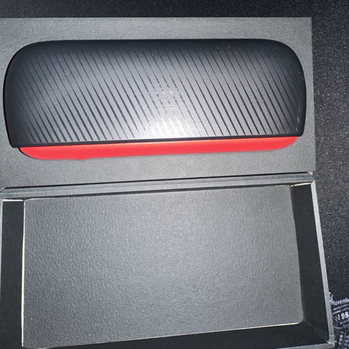 Iqos Iluma iUnlock device with box and cable