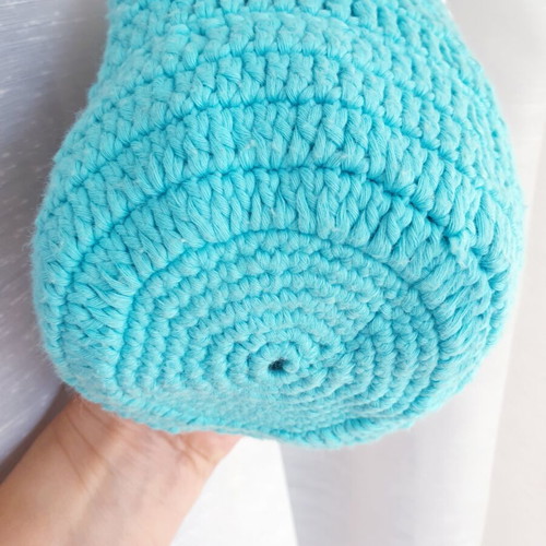 Handmade turquoise knitted pouch toiletry bag used