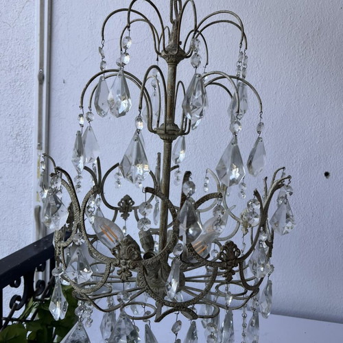 Bulgari crystal ceiling lights used with gold patina, two six-light and one single-light
