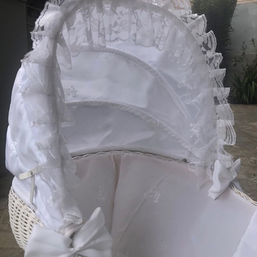 Doll pram used with white wicker basket
