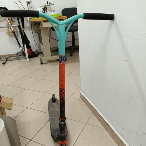 BMX stunt scooter used with scratched bottom