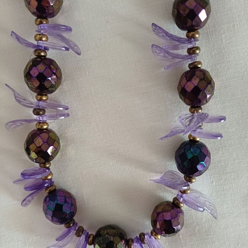 Medium-length necklace used, purple stones in two shapes