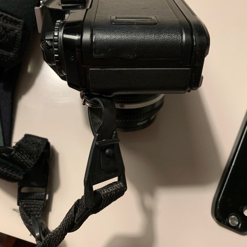 Nikon F-301 with nikkor 50mm 1:1.8 lens and HoyaHMC filter like new