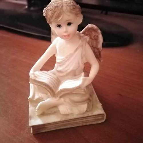 Angel figurine beige color like new