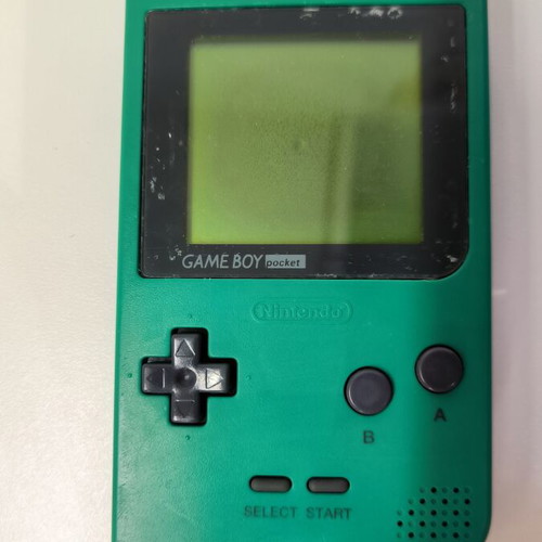 Game Boy Pocket Green console used with Test Drive 6 game